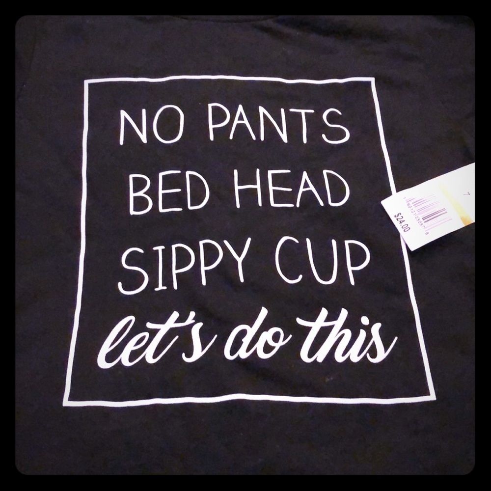Toddler t shirt. New w/ tags. Size 7 fits like a 5